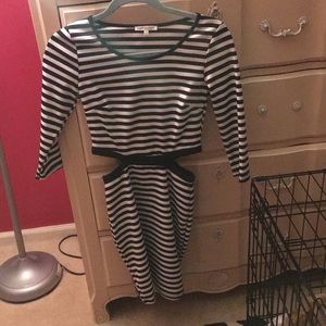 Dress with sides cut out